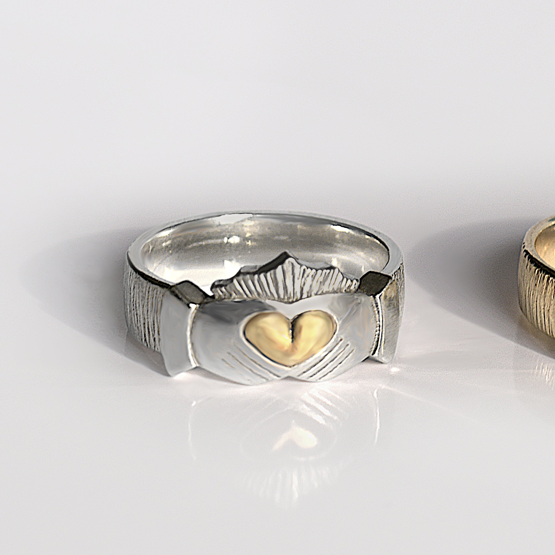 Ériu | Claddagh Sterling Silver Ring with Solid 9ct Gold Heart by Martina Hamilton | Award-winning Irish jewellery designer from Sligo