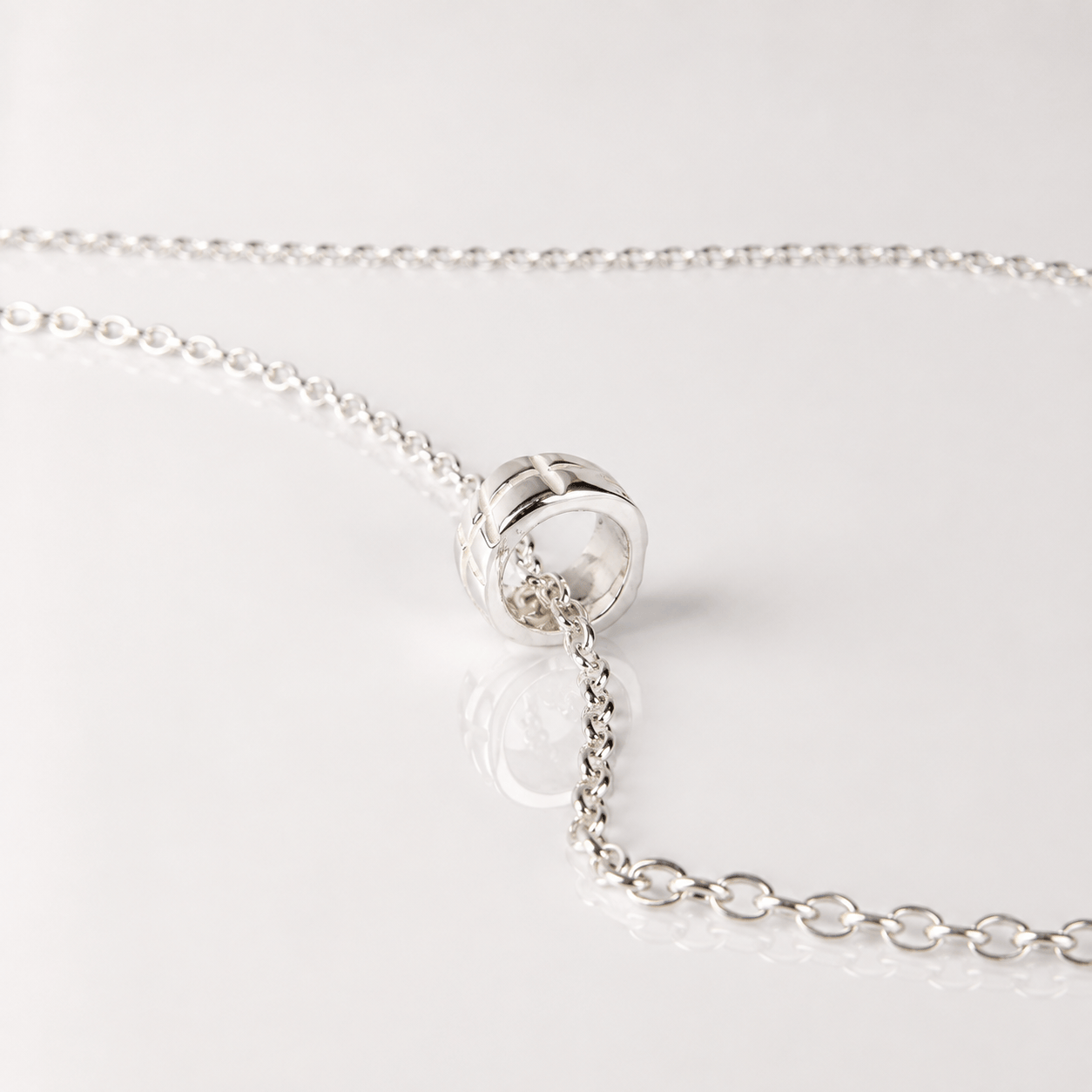 Martina Hamilton 2 Bell Ogham | Baby Ring Grá Necklace