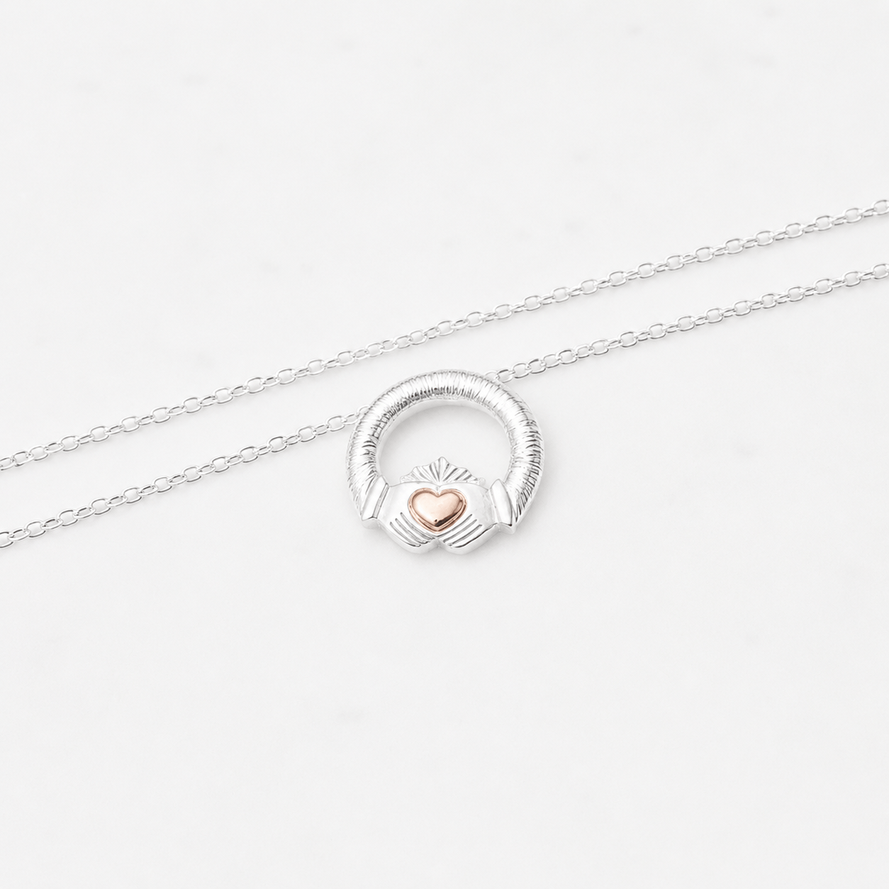 Martina Hamilton Ériu | Claddagh Sterling Silver with Solid Rose Gold Heart Pendant