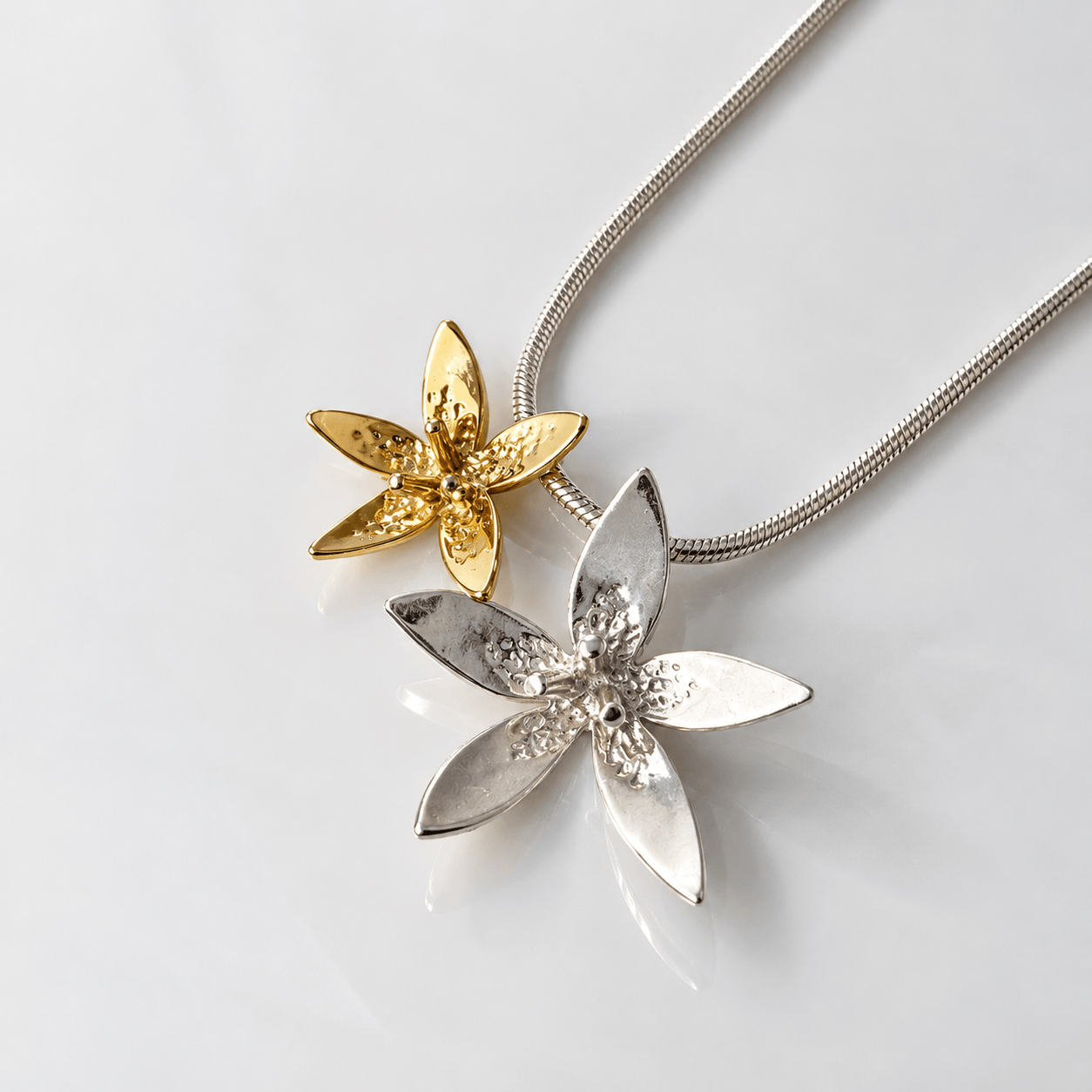 Martina Hamilton Star Flower | Sterling Silver and 9ct Solid Gold Double Floral Bell Chain Pendant